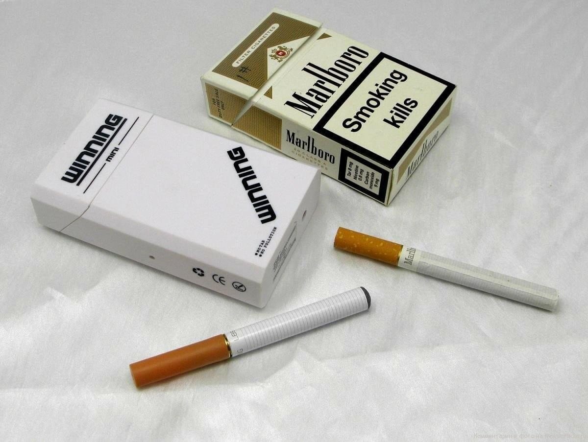 Сигареты для некурящих актеров купить. Безвредные сигареты. Никотиновые сигареты. Электронная сигарета и пачка сигарет.